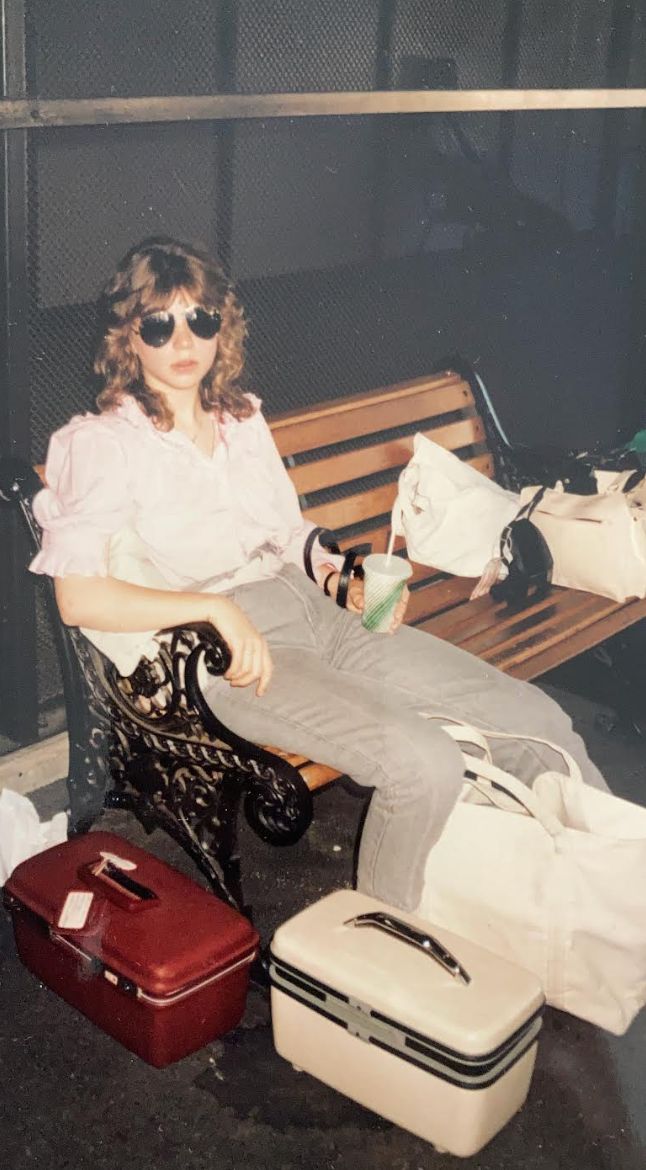 The author is seen at age 15 upon arriving at an airport in California, ahead of shooting for "Harry and the Hendersons."