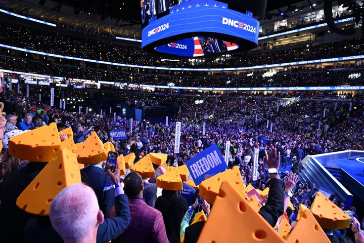 Wisconsin delegates wearing cheese hats take part in the ceremonial roll call vote on the second day of the Democratic National Convention (DNC) in August. Wisconsin is one of seven swing states. 