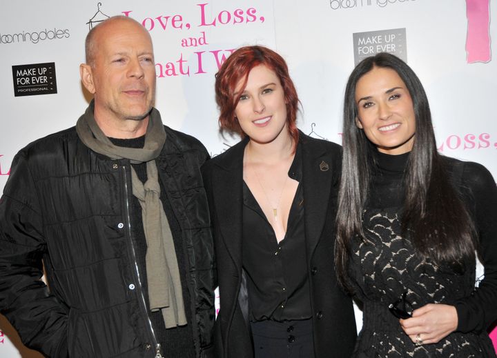 Bruce Willis and Demi Moore with their daughter Rumer Willis at a "Love, Loss & What I Wore" event in 2011.